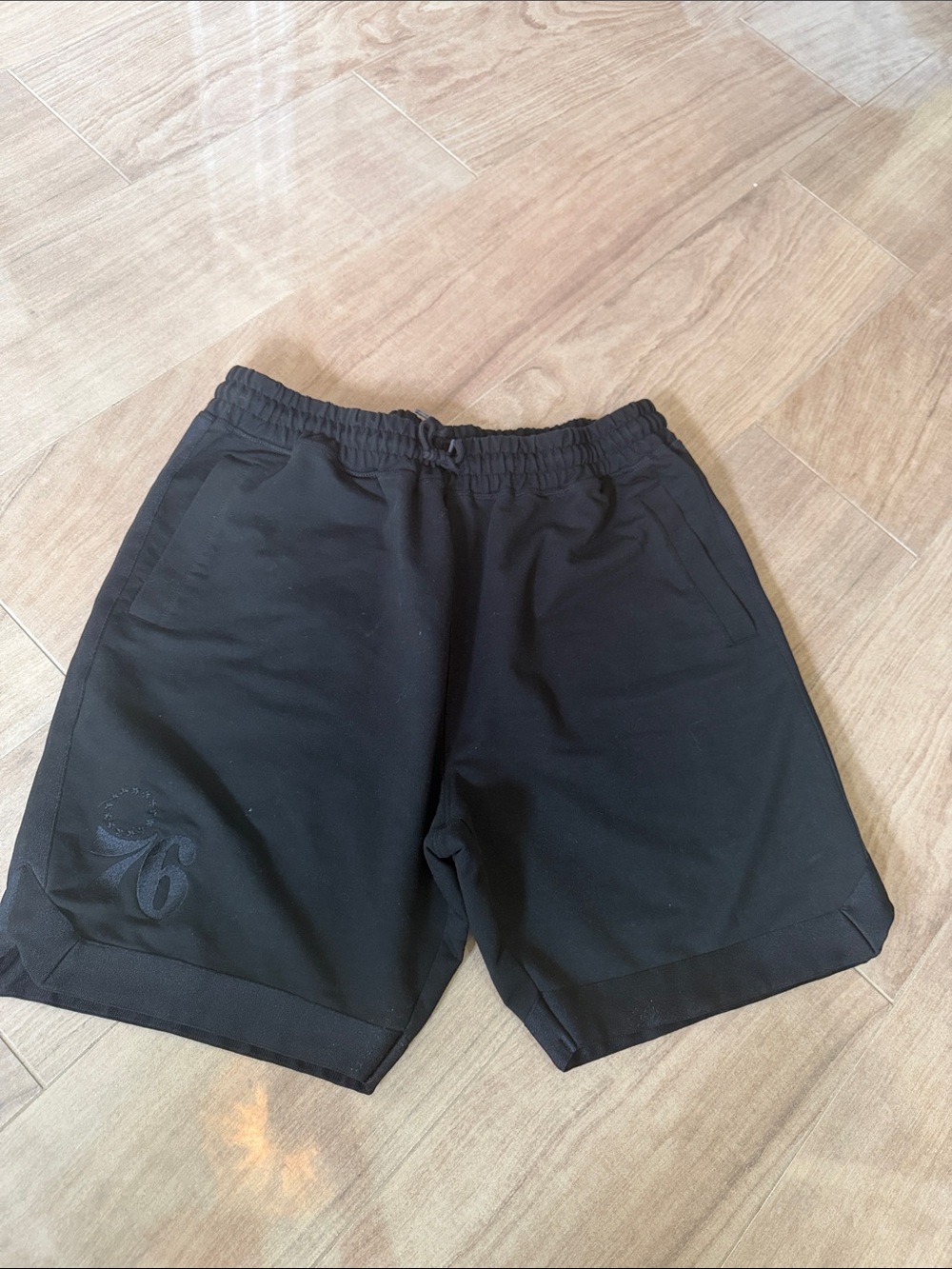 New Era Men's Black 76ers Athletic Shorts with Subtle Logo